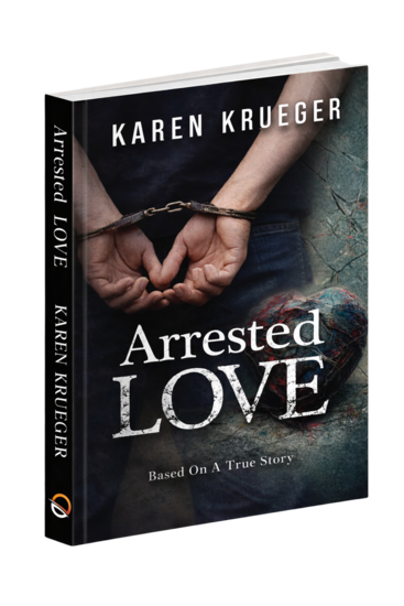 alt="Book cover showing a man with handcuffed behind his back. Background is dark and there is a stone heart to the lower right of the hands."