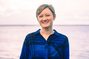 Photo of a woman in a blue shirt
