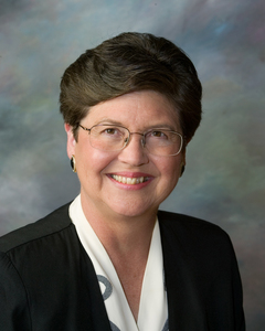 headshot of Nancy Mangini appearing in cover art and marketing materials in 2025 for launch of The Eyes of Tandor