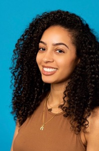 Dani James smiling 