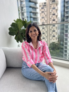 A smiling photo of Yashika