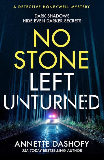 Police vehicle driving through a wooded area at night with the title No Stone Left Unturned and author's name Annette Dashofy