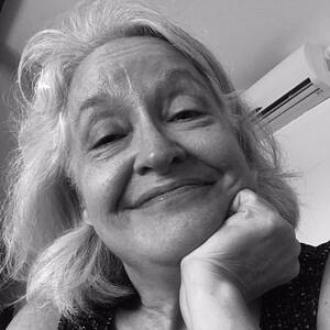 Author smiling into camera