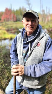 Photo of A. Keith Carreiro in the western Maine forest.
