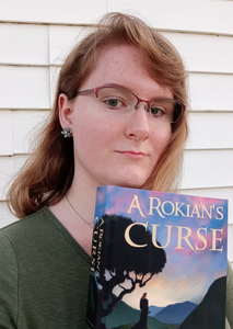 Self-published author with debut book in hand.