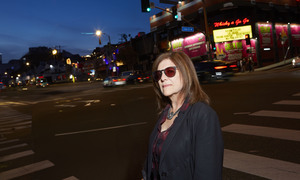 Night shot of author with the iconic Whisky a Go Go sign behind her