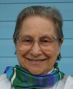 photo of Janine's face, facing front, smiling
