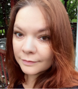 Outdoor headshot of Tammy Burke, YA fantasy author of HEART OF THE WORLDS series