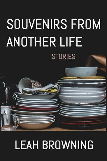 Book cover photograph featuring a pile of dishes