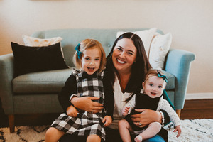 photo of writer with children in a field outside