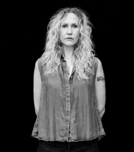 Closeup of Tara Skurtu, white woman with long blond hair