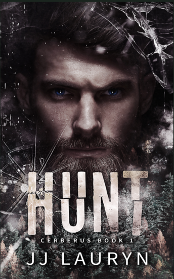 Man with blue eyes looking out over pine forest trees