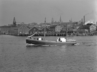The-fishing-boat-Jennie---Lucia-in-Harbor-Cove--Gloucester--MA--1937--photograph-by-John-C--Adams---Requisitioned-during-WWII--Courtesy-of-the-Cape-Ann-Musuem-Library---Archives--Gloucester--MA-.jpeg