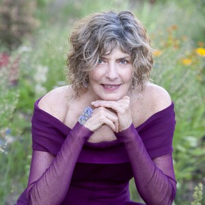 Sierra Faith Sitting with Hands Under Chin