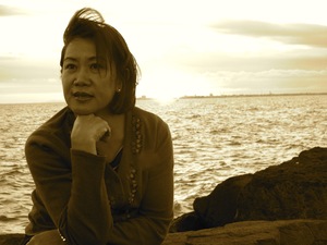The author waiting for penguins to appear at dusk in St. Kilda's Beach, Melbourne, Australia
