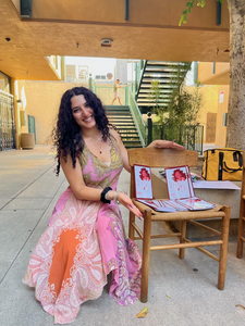 smiling with one of my books