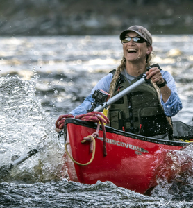 Angela canoeing down the St. John River in Maine.