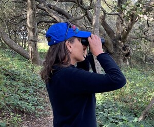 A photo of Susan M. Gaines birdwatching