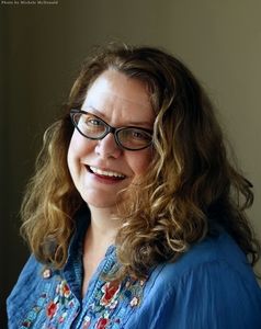 Author's headshot appears for identification.