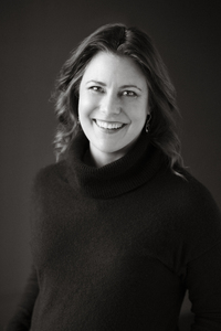 headshot of Shannon Huffman Polson in black turtleneck