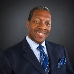 “Professional portrait of author and executive producer Oscar J. Starr III.”
