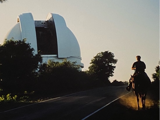 Jean Mueller rides a horse on the south side of the Palomar Observatory during observations of comet Shoemaker/Levy 9’s impact on Jupiter in 1994. (Nancy Christiansen)