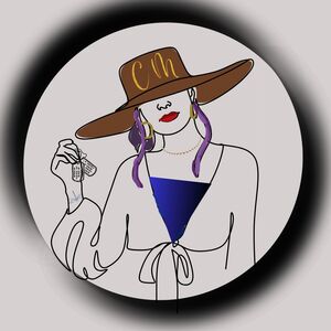 woman in large hat holding dog tags