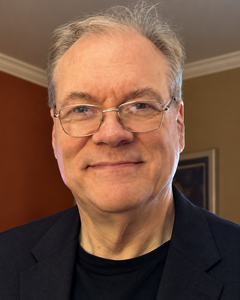 Portrait of author Mitchell Hadley
